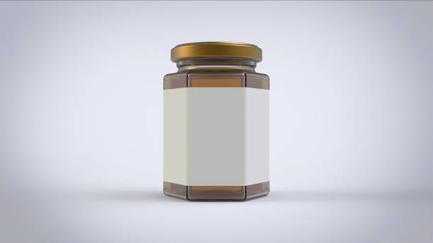 Honey jar with white lable mockup 3d rendering image 250 ml honney jar with white rectangle paper label in front plate on white solid background mockup  ready for branding 3d rendering image Hexagon stock pictures, royalty-free photos & images