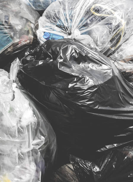 istock Piles of garbage in plastic bin bags 1299069819