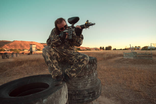 istock enjoying a game of paintball 1299070572