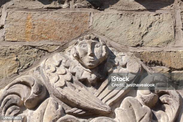 Angel Relief At Facade Of Church In Paderborn Stock Photo - Download Image Now - Angel, Architecture, Art