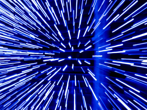 istock Blue christmas background with white and blue lights, blur 1299070910