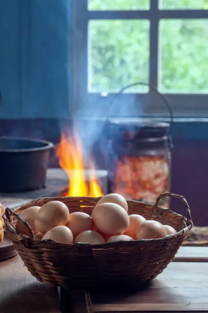 Farm eggs with wood stove in the background