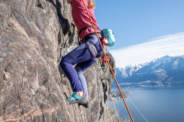 istock Mountain climber ascend rock face 1299075851