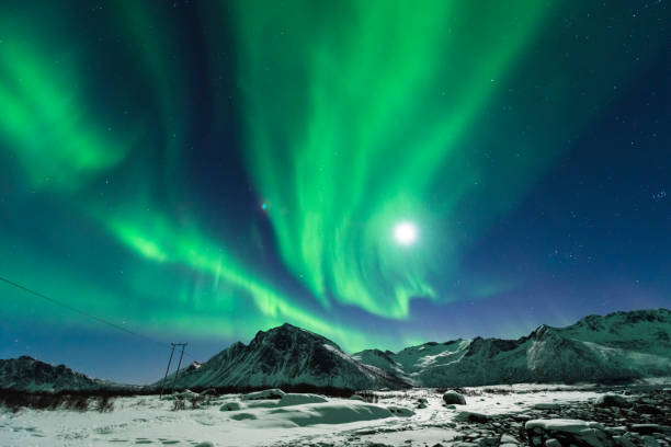 istock Aurora Northern Polar light in night sky over Northern Norway 1299077394