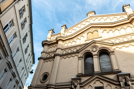 low angle view on Tempel Synagogue  at Kazimierz district in Krakow against blue sky