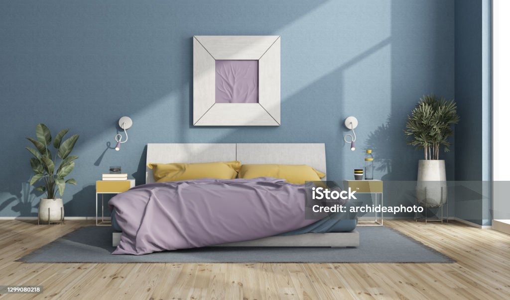 Colorful double bed in a modern room with blue walls Colorful double bed in a modern room with blue wall, picture frame and house plants - 3d rendering
Note:  room does not exist in reality, Property model is not necessary Purple Stock Photo
