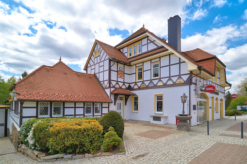 Schierke, Germany – May 21, 2020: Parent house of the Schierker Feuerstein brand in a pharmacy in Schierke in the Harz National Park. The pharmacist Willy Drube applied for a patent for the herbal liqueur in 1924.