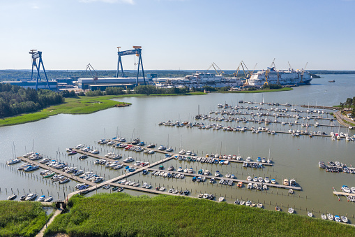 RAISIO, FINLAND - 27/06/2020: Aerial view of Raisio Marina and Meyer Turku Shipyard in summer