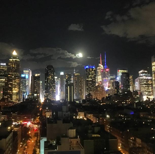 The beautiful Manhattan skyline by night. stock photo