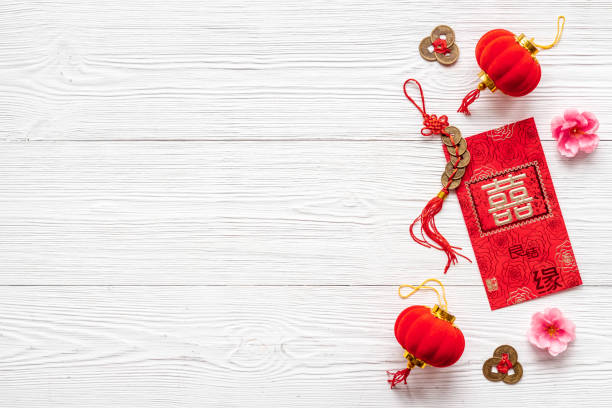 istock Chinese or lunar new year decorations. Chinese characters on postcard meaning double happiness 1299086408