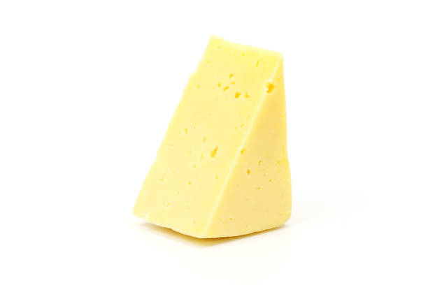 istock Piece of cheese isolated on white 1299089800