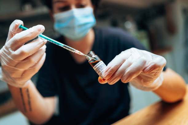 Pharmacist holding the Covid19 vaccine vials