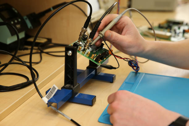 istock Scientific works, soldering of small details. 1299094043