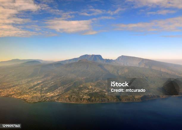 Reunion Island Seen From The Air With The Piton Des Neiges Mountain Reunion Island Indian Ocean Stock Photo - Download Image Now