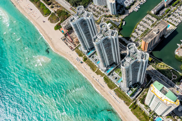 Florida Beach Resort Aerial Aerial view of a South Florida beach resort shot from directly overhead at about 1000 feet in altitude. miami photos stock pictures, royalty-free photos & images