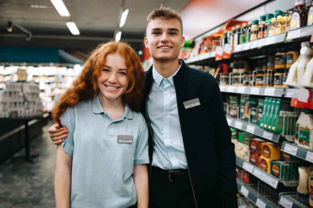 istock Trainee employees of supermarket 1299097453