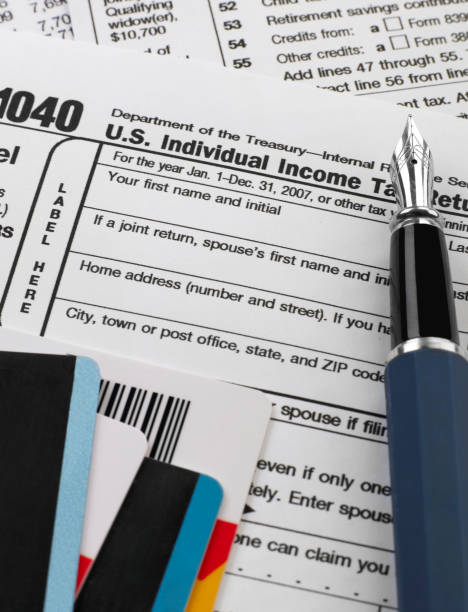 istock 1040 tax form and credit cards 1299097608
