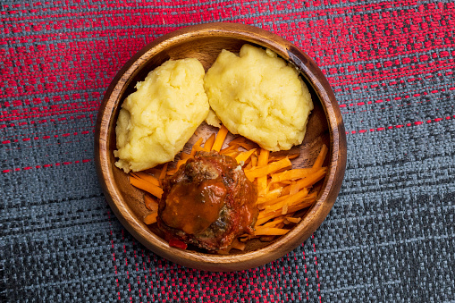 plate of ugali nshima most popular dish in Zambian. selective focus