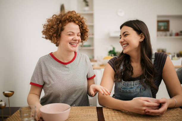 istock Two Caucasian female having a meal at home 1299098920