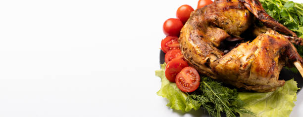the image a baked Lamb with tomatoes