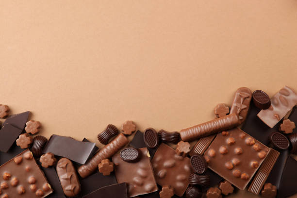 istock Chocolate products of different types on a colored background close-up with a place for text 1299101439