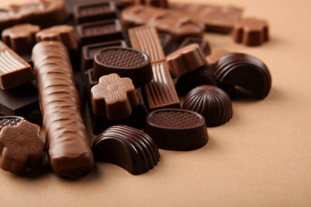 istock Chocolate products of different types on a colored background close-up with a place for text 1299101601