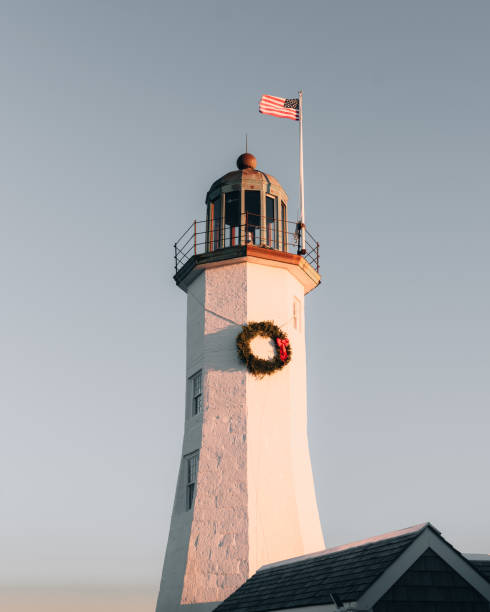 istock East Coast Ocean Beach lighthouse at Sunset 1299101610