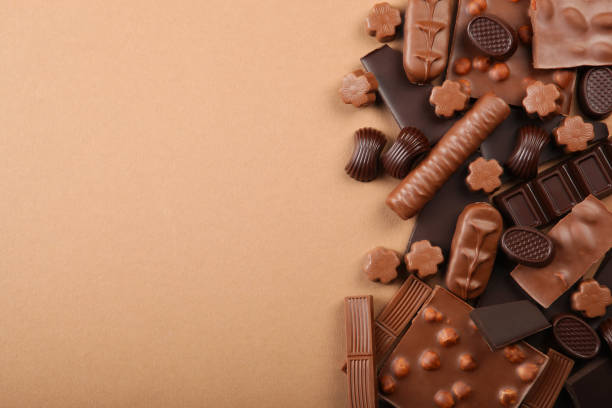 istock Chocolate products of different types on a colored background close-up with a place for text 1299101823