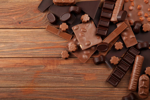 istock Chocolate products of different types on a colored background close-up with a place for text 1299101825
