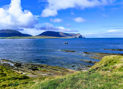 the hills of North Hoy across the Hoy channel from near Stromness  (The Ness) in the Orkney Islands to the north of Scotland