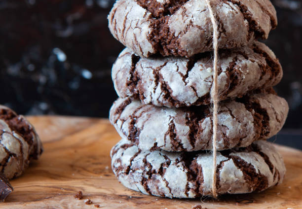 istock Chocolate crinkle cookies baked. Chocolate cookies as a gift 1299103090