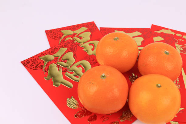 istock Lucky Money in Red Envelope and Orange 1299105696