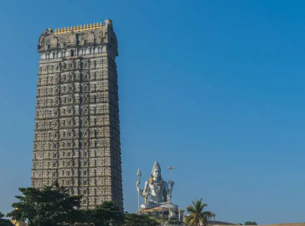 View of the world's tallest Gopura or Gopuram of Murdeshwar temple, with the second tallest Lord Shiva statue in the world at Murdeshwar,Karnataka,India. It is located on the coast of Arabian Sea.