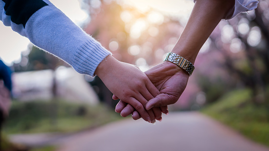 The Hand Of The Young Couple Holding Hands Walking Forward On The Day Of Love Stock Photo - Download Image Now - iStock The Hand Of The Young Couple Holding Hands Walking Forward On The Day Of Love Stock Photo - Download Image Now - iStock