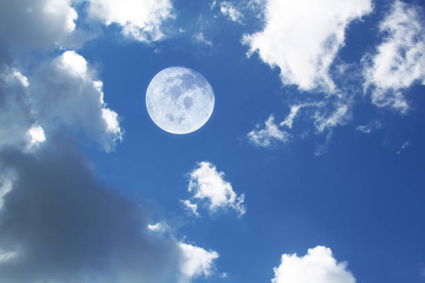 istock moon in white clouds sky background, Elements of this image furnished by NASA 1299112012