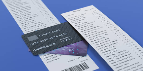 istock Credit cards and paper receipt on blue background. 3d illustration 1299112774