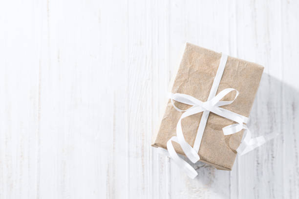 istock Valentine's day gift box. Valentine's day gift on wooden background 1299113844