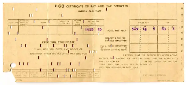 An old British P60 - a certificate of pay and tax deducted - for 1958-59. This person earned £549 16s 5d during the tax year and paid £30 3s 0d in tax. (All identifying details removed.)