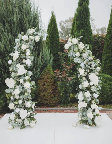 istock wedding arch made of flowers 1299115425