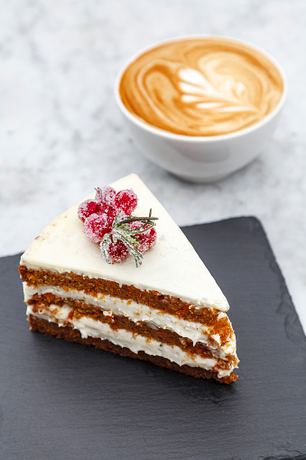 A delicious piece of cake with coffee.