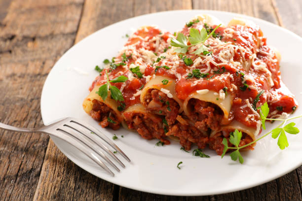 istock canelloni- pasta with minced beef, tomato sauce and cheese 1299120529