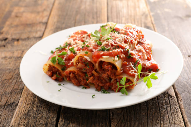 istock canelloni- pasta with minced beef, tomato sauce and cheese 1299120549