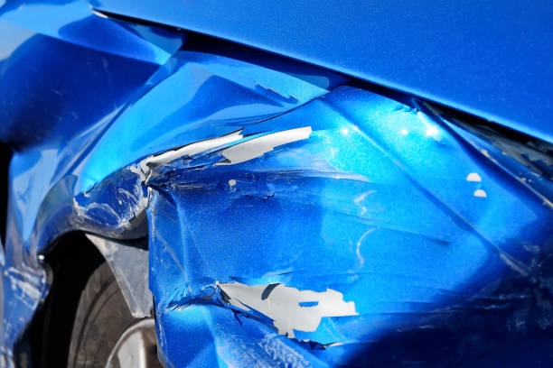 istock Blue car after a traffic accident. 1299121856