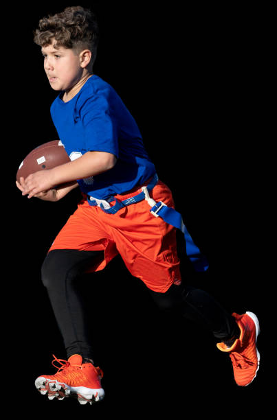 istock Young Athletic Boy Playing Flag Football 1299123572