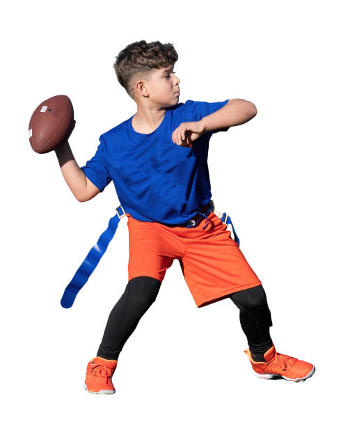 Young Athletic Boy Playing Flag Football Young boy (child) in orange and blue playing in a youth flag football game broad catch stock pictures, royalty-free photos & images