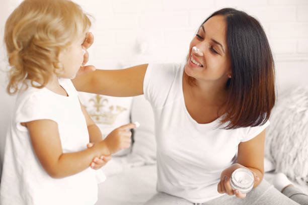 istock Mother and little daughter have fun at home 1299124171