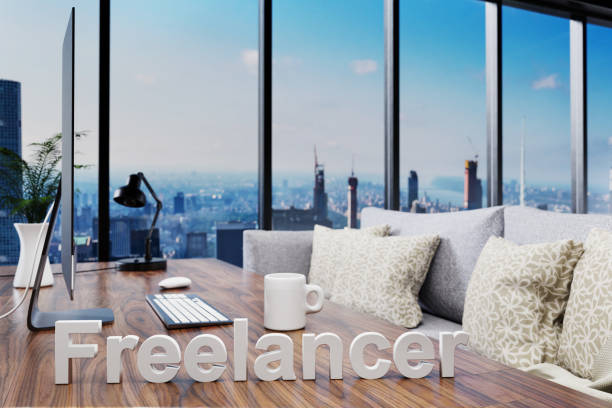 istock freelancer; cozy couch in front of modern workspace with computer and skyline view; work from home concept; 3D Illustration 1299124298