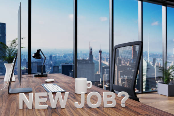 istock new job; cozy couch in front of modern workspace with computer and skyline view; hiring concept; 3D Illustration 1299124868