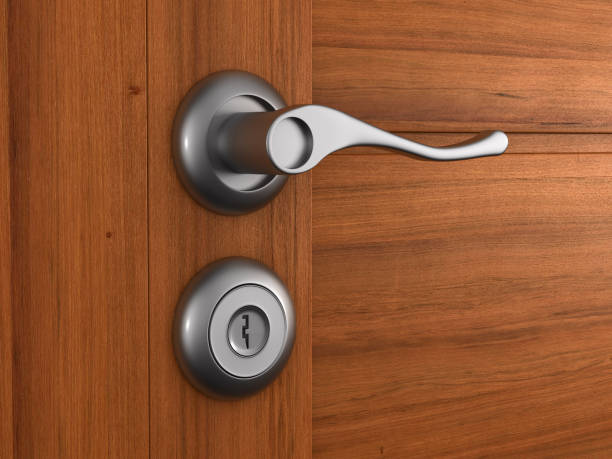 istock handle and wooden door. 3D illustration 1299126731