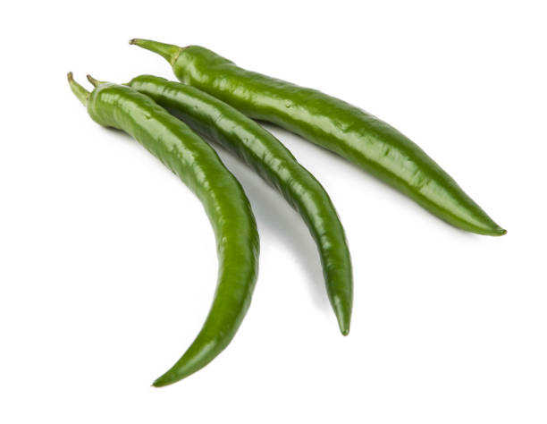 istock Small peppers isolated on a white background. View from another angle in the portfolio. 1299130808